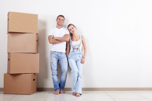 Professional furniture removals in Shepherdsbush on a residential street