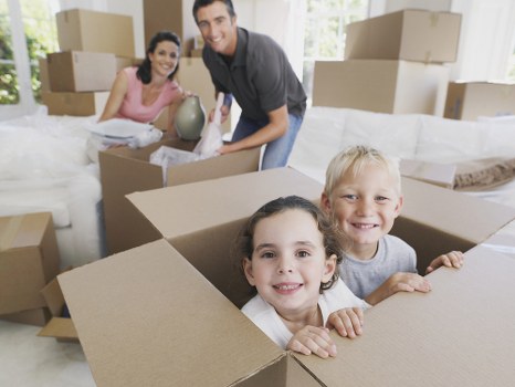 Removal van and moving boxes representing transparent Shepherdsbush pricing