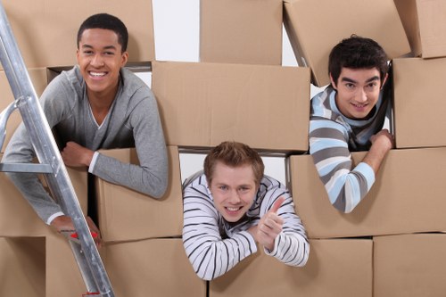 Specialist movers using equipment for piano removals in Shepherdsbush