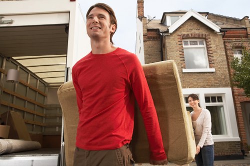Removal crew loading furniture during a Shepherdsbush move