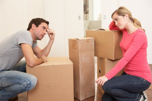 Loading household belongings into a moving vehicle