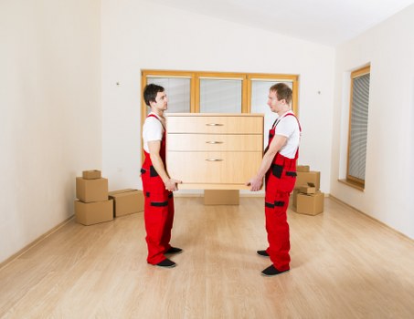 Planning a flat move in Shepherdsbush with labeled boxes and checklist